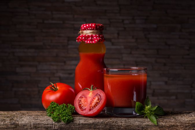 Still life of tomatoes and juice