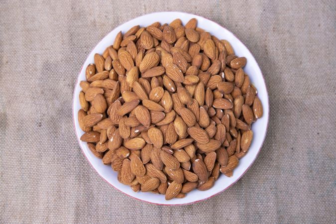 Top view of a bowl almonds