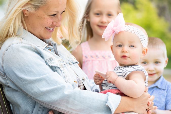 Mother and Children At The Park