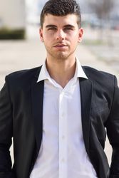Man in suit standing tall