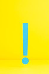 Blue exclamation mark on yellow background
