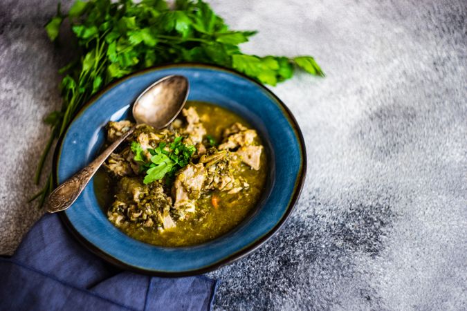 Georgian chakapuli stew with fresh herbs