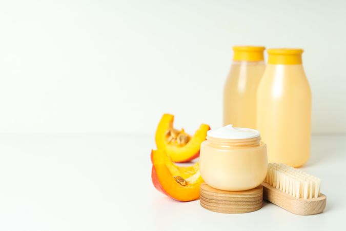 Skin care and face care concept - pumpkin cosmetic