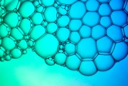Abstract background bio technology, macro photography foam and water with gradient background. Molecule multicolor backgorund