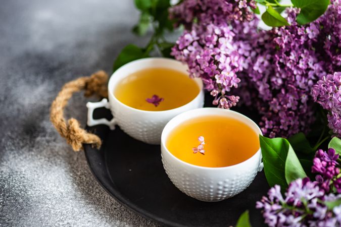 Asian style tea concept with delicate tea and pink flowers