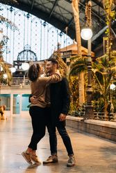 Happy couple hugging in pavilion