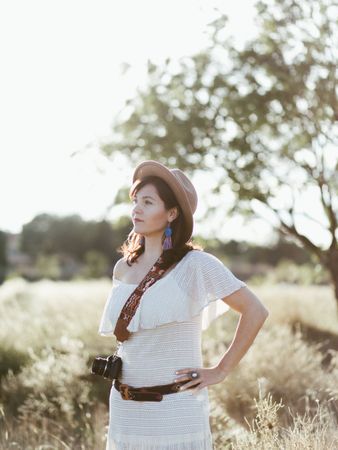 Charming smiling woman with trendy accessories outdoors