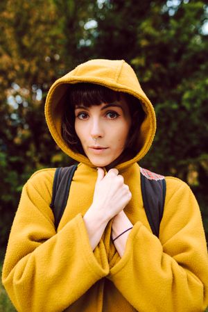 Frozen woman wrapping in coat