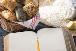 Blank open book and bread buns