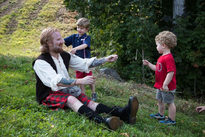 Man and sons at the New Hampshire Highland Games and Festival in Lincoln, New Hampshire