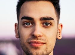Portrait of a young man in the countryside