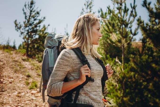 Woman exploring nature while hiking