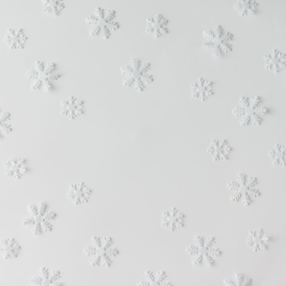Winter snowflake pattern on light background