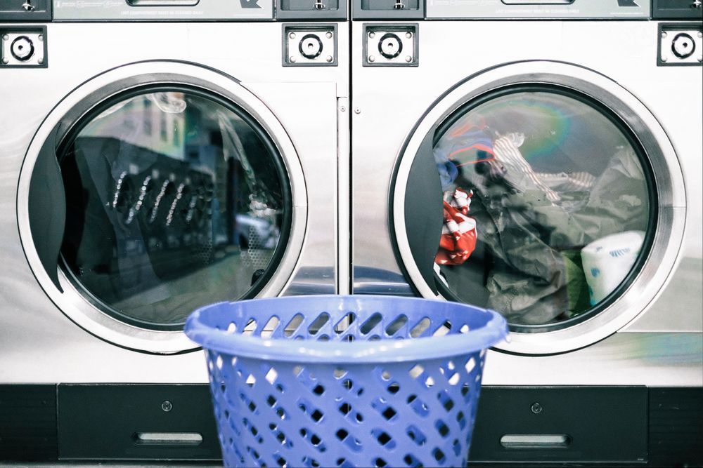 Basket in front of laundry machines