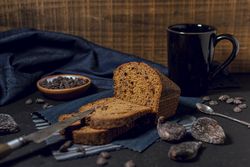 Baked cake and hot chocolate mug