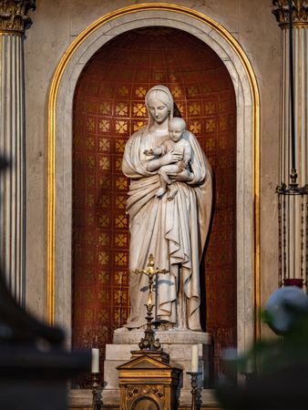 Ancient sculpture in one of the churches of Paris. Antique art.