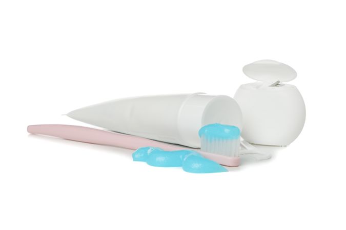Dental care kit isolated on light background