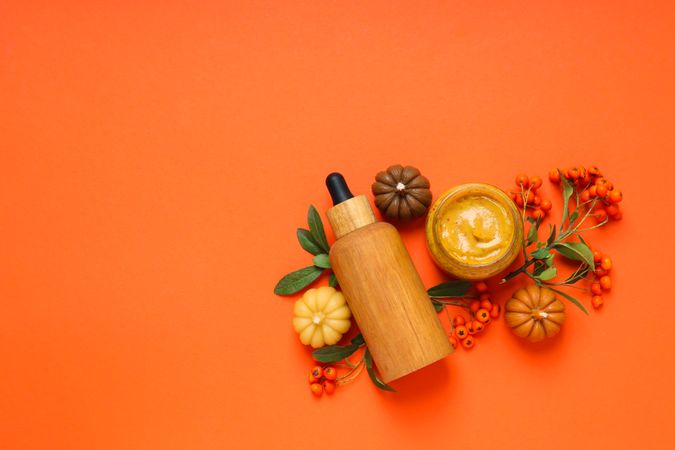 Concept of different cosmetic products, Pumpkin cosmetics, space for text