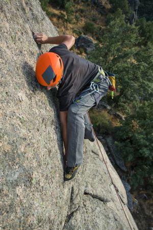 Man climbing a rock