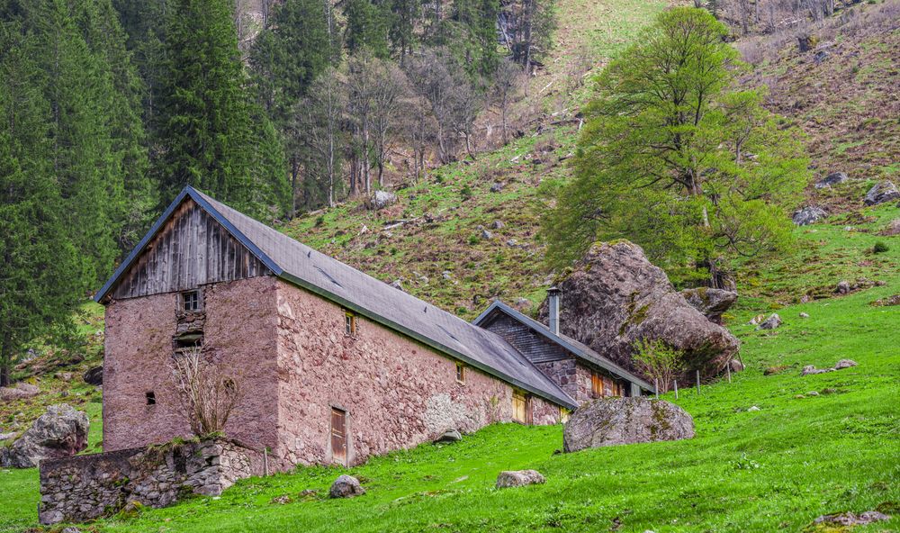 Traditional wall stone stable and house