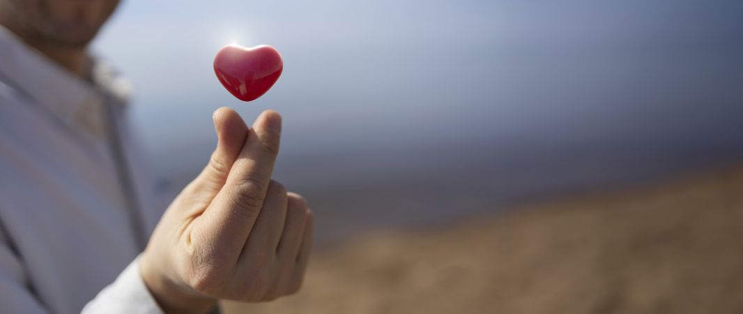 Man Shows Love with Shining Heart