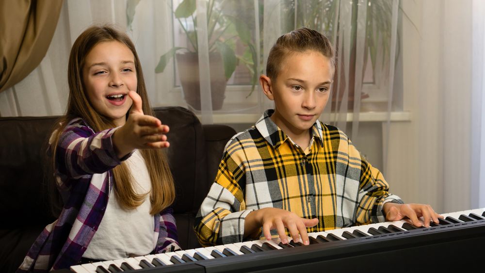 Siblings' Piano Time at Home