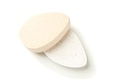 Bath sponges isolated on blank background, closeup