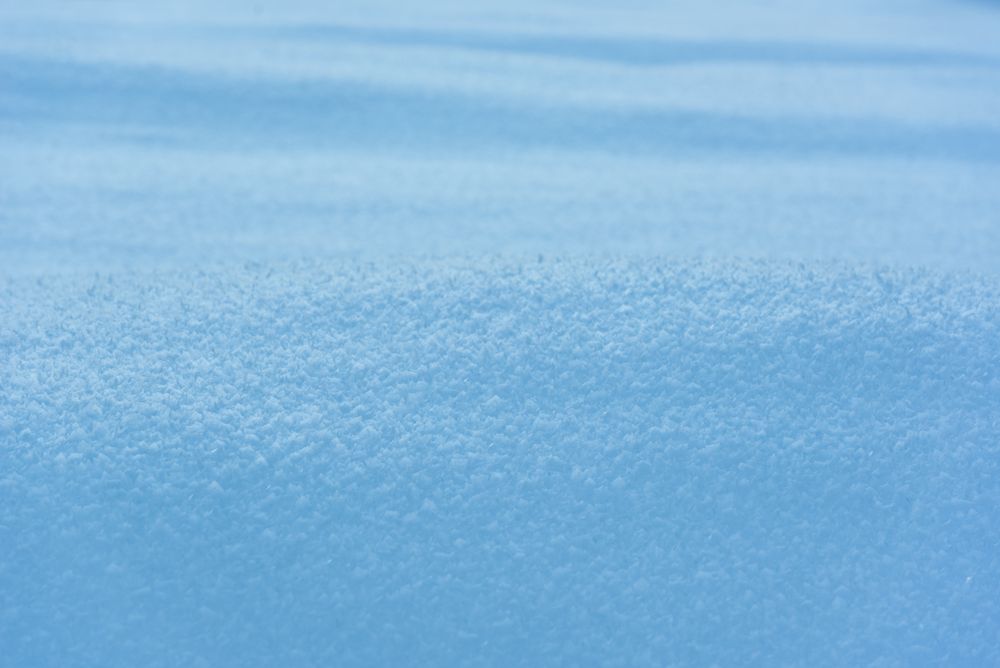 Winter background, full-frame with deep snow in the Bavarian Alps, Germany