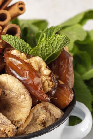 Dates fruits with walnuts, mint and cinnamon for Ramadan