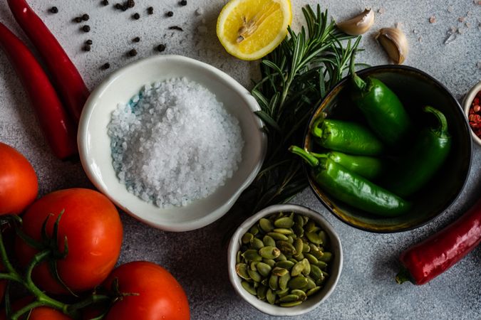 Bowl of peppers with seasonings & pumpkins seeds