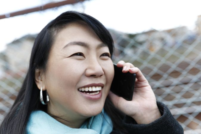 Woman having a phone call outdoor