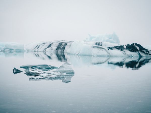Ice on water between snow