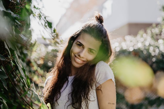 Cheerful woman in garden