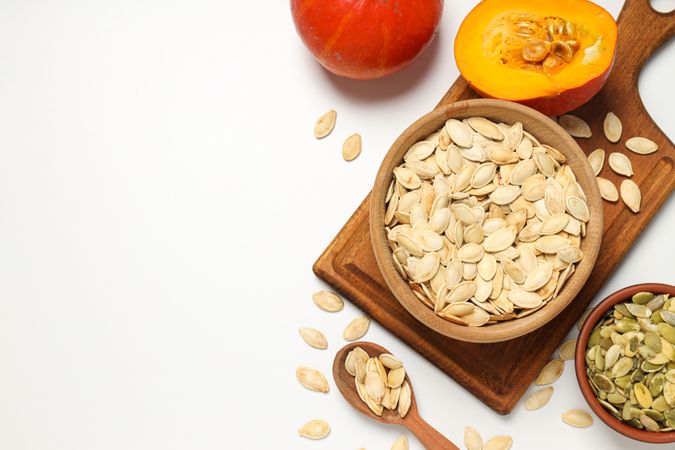 Cooking ingredients for fall season - pumpkin seeds, pumpkin