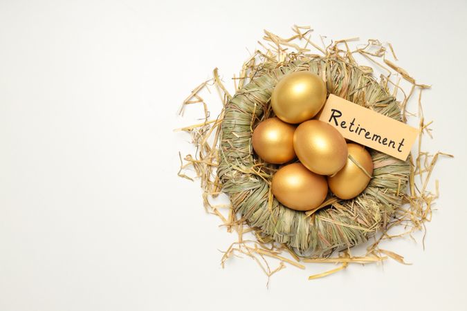 Golden eggs, pension savings, investments, retirement, space for text