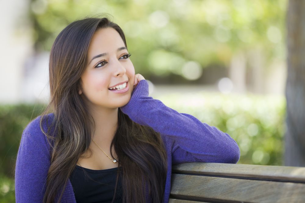 Whimsical Female Student Portrait on School Campus