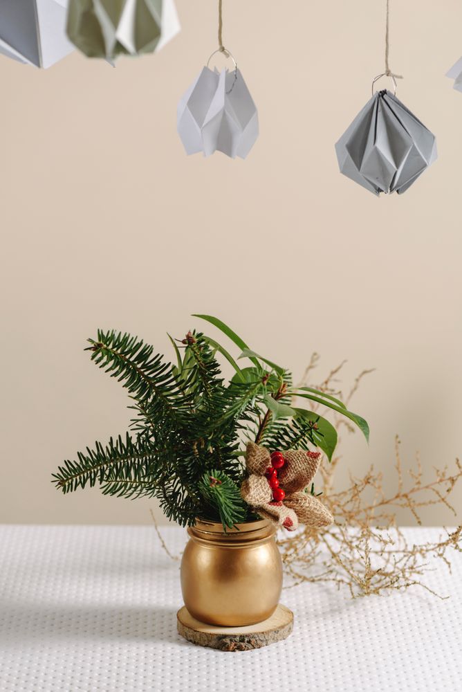 Christmas Tree in gold vase with Pine Branches Bouquet