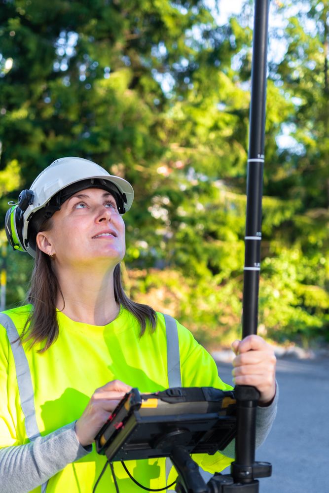 Woman working on measurement machine outdoor