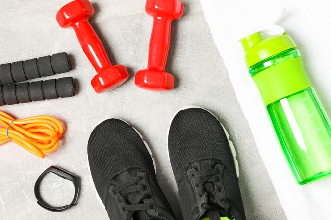 Composition with healthy lifestyle accessories on grey background