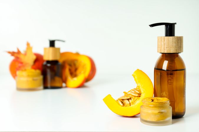 Skin care and face care concept - pumpkin cosmetic