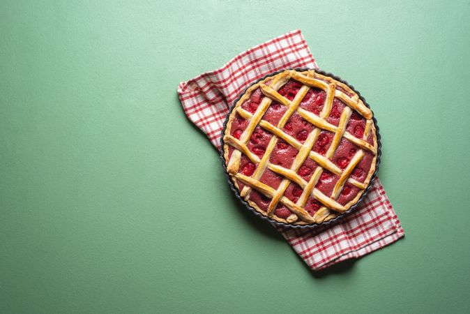 Raspberries cake with a lattice crust. Pie top view