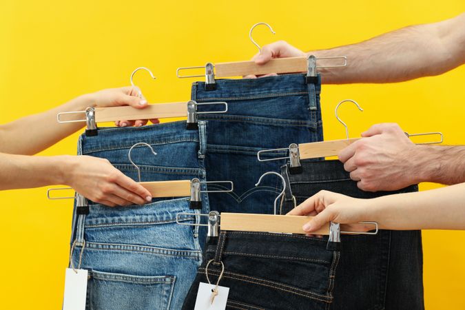 Jeans with tags on hangers
