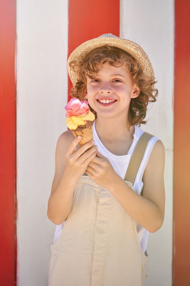 Smiling boy with ice cream