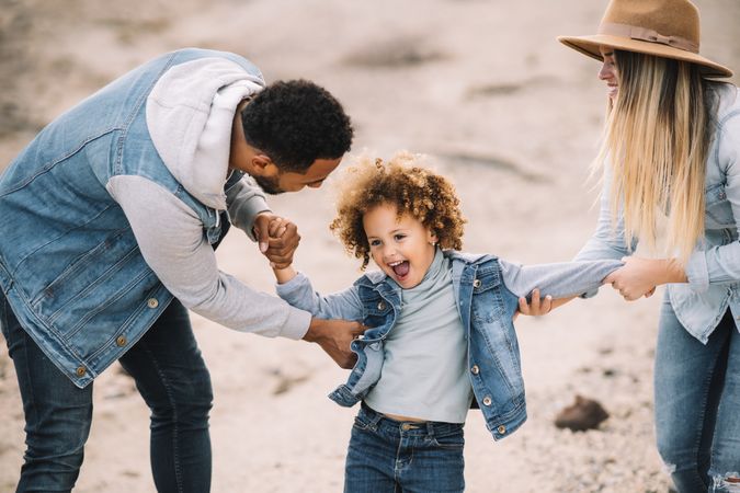 Happy multiethnic family gathering on nature