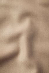 Wavy smooth pattern brown fabric background texture.