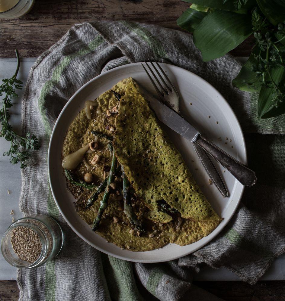 Served vegetarian crepe with oats and asparagus