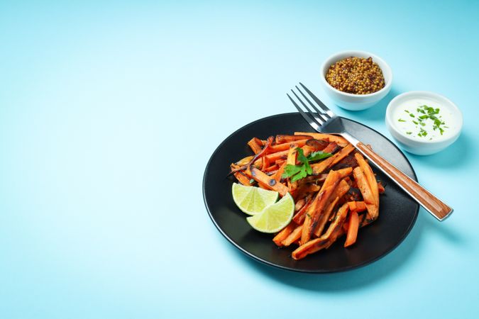 Concept of tasty food, fried sweet potato, space for text