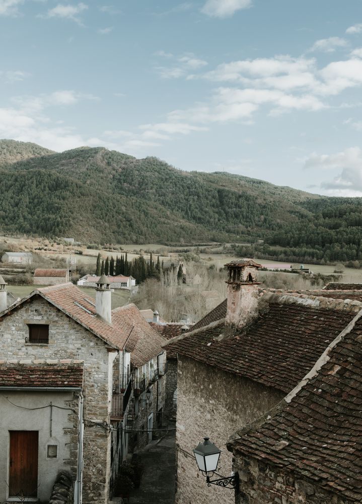 Old buildings in city near mountains