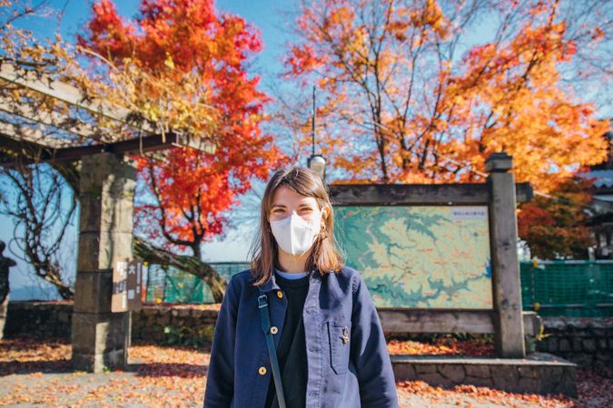 Female tourist with facemask in Tokyo, Japan