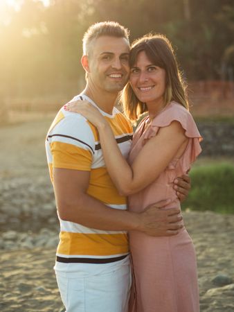 Couple looking al camera with happy smile g at each other